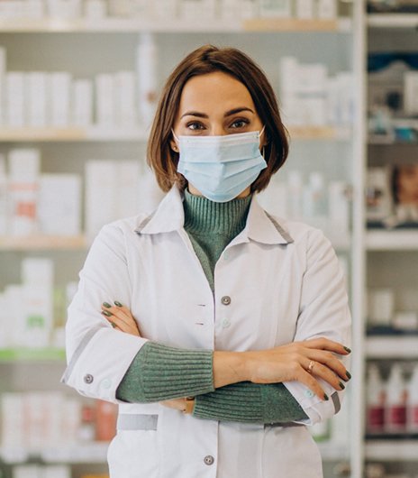 Pharmacist with arms crossed